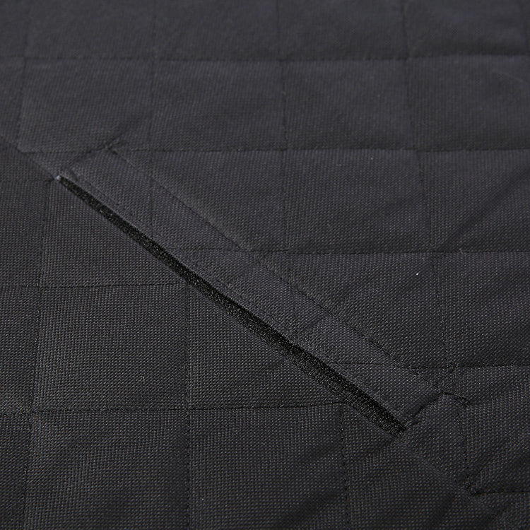 Black quilted pet mat for dog or cat comfort, durable fabric with stitched squares