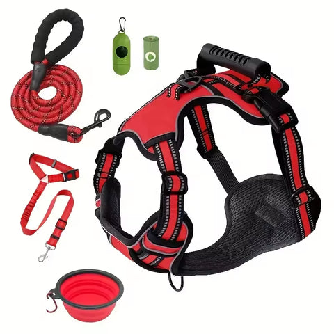 Red dog harness with leash, poop bag dispenser, and collapsible bowl — perfect pet supplies for walks and travel.