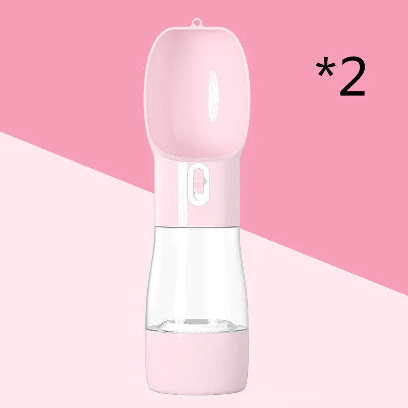 Pink portable pet water bottle for dogs and cats, leak-proof design with clear reservoir