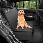 Golden retriever on black quilted dog car seat cover, perfect for pet travel and car protection.