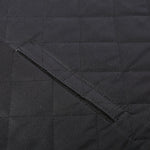 Black quilted pet mat for dog or cat comfort, durable fabric with stitched squares