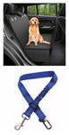 Golden retriever on car seat cover with blue pet safety harness for dogs