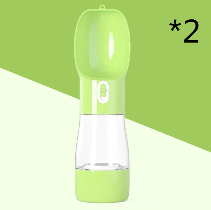 Green portable pet water bottle with clear reservoir for dogs and cats, ideal for travel and outdoor use