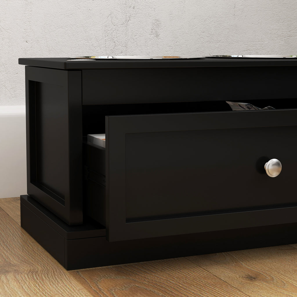 Black storage cabinet with open drawer on wooden floor