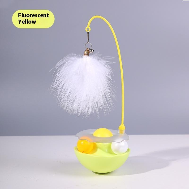 Fluorescent yellow cat toy with feather wand and interactive ball base for playful feline fun