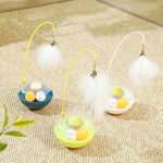 Colorful cat toys with feather wands and ball tracks for interactive play and exercise