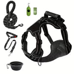 Black dog harness, leash, poop bags, and collapsible bowl for walks and outdoor adventures