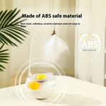 Cat toy with feather wand and egg-shaped base, made of safe ABS material for interactive play