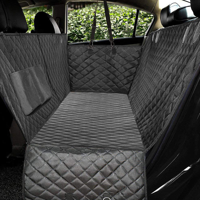Quilted black pet car seat cover for dogs, protecting backseat with durable, waterproof design