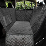 Quilted black pet car seat cover for dogs, protecting backseat with durable, waterproof design
