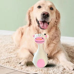 Happy golden retriever with cow-shaped dog toy on rug, perfect pet supplies for playful pups