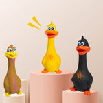 Fun rubber duck dog toys in yellow, brown, and black for playful pets