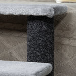 Soft gray cat tree with textured scratching post and cozy knitted base, perfect for feline play and rest.