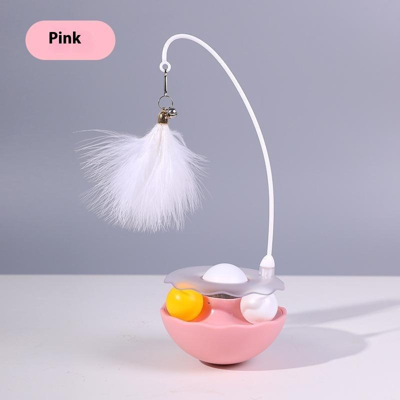Pink cat toy with feather wand and interactive balls for fun playtime