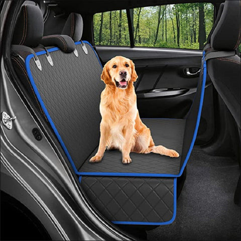 Golden retriever on black quilted car seat cover with blue trim, perfect for pet travel and dog accessories.