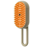 Orange and gray pet grooming brush with soft silicone bristles for dogs and cats