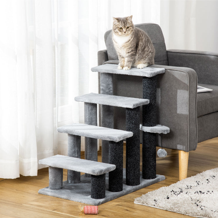 Gray cat on multi-level cat tree with scratching posts and plush steps, perfect for cat accessories and play.
